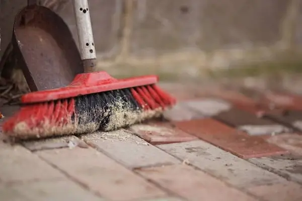 Clearing debris from the driveway
