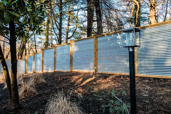frame corrugated metal fence