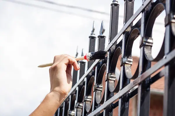How To Paint A Metal Fence Finishing Touches and Maintenance
