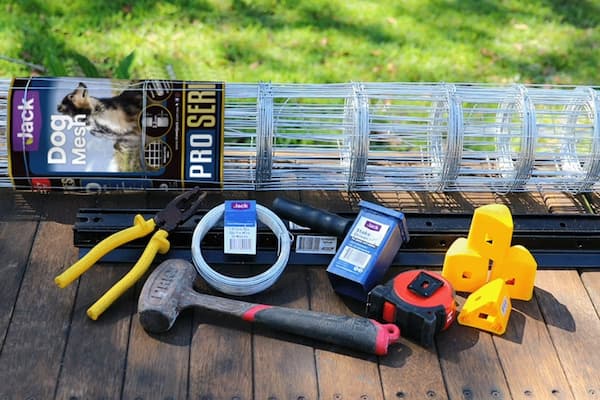 how to secure the bottom of a chain link fence fencing tools