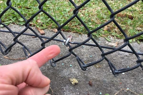 how to secure the bottom of a chain link fence secure chain link fence bottom