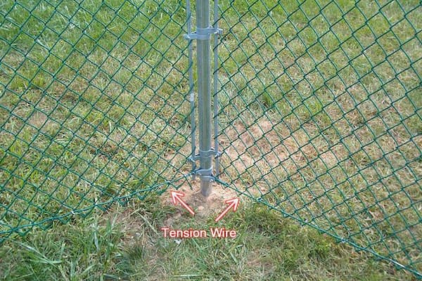 how to secure the bottom of a chain link fence tension wire in fence